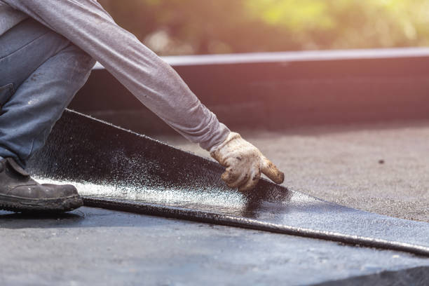 Professional Emergency Waterproofing technician working in Deputy, IN